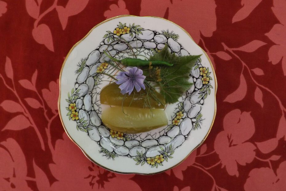 Pickles with grape leaf
