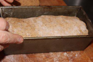 Putting the loaf into the pan