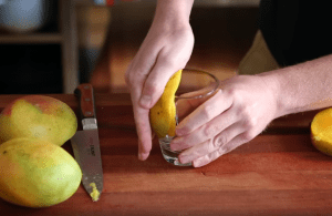 Peeling a mango