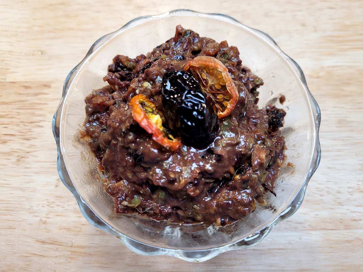Tapenade with dried tomatoes, olives, garlic, and capers