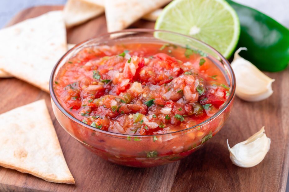 Salsa Asadawith roasted vegetables, served with a tortilla chips and lime, horizontalSalsa Asada