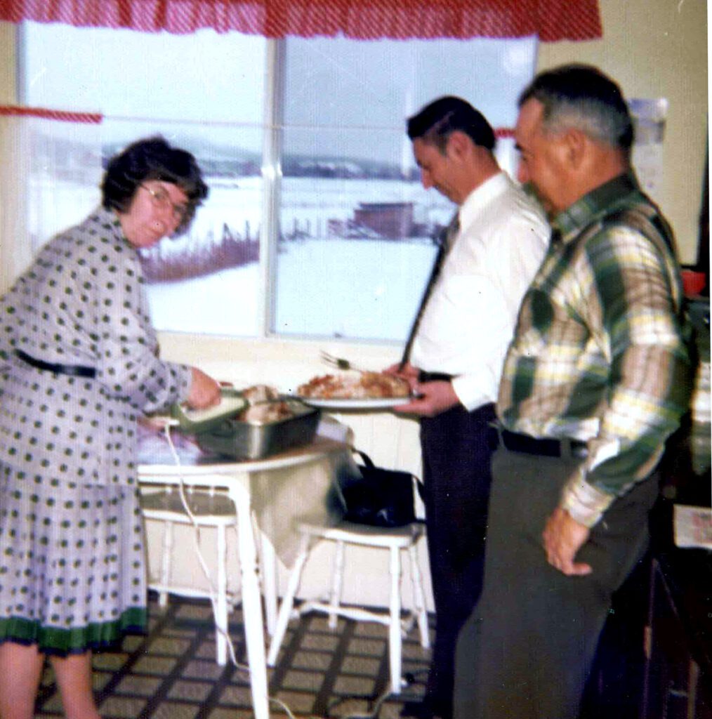 Grandma Nelson serving food