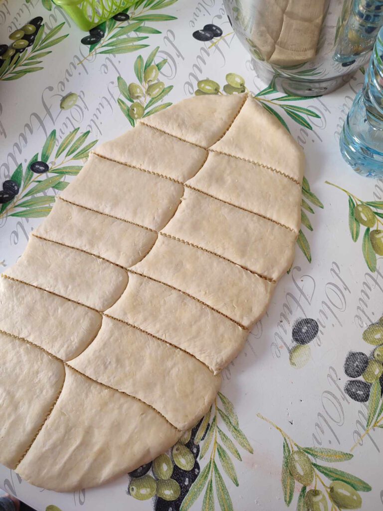 Baklawa dough rolled and cut for sheeting