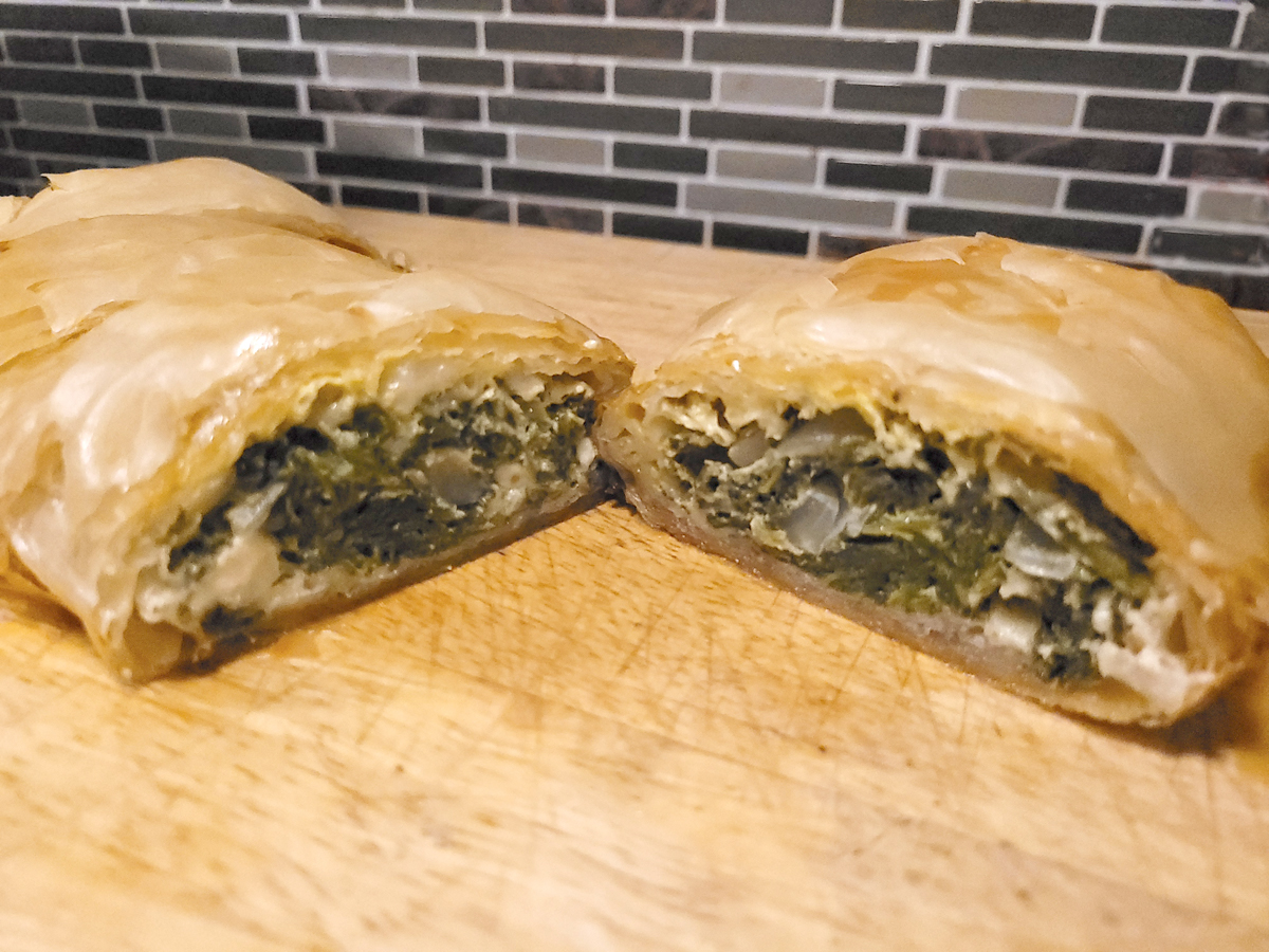 Finished Spanakopita, cut and ready to serve